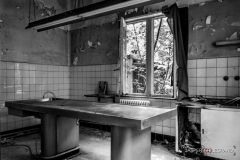 "Autopsy table in an old abandoned psychiatric women's hospital" / Photographer - Jasper Legrand