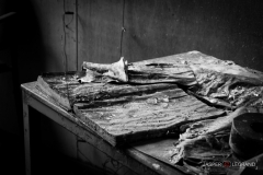 "weathered book and papers on a bench in an abandoned factory" / Photographer - Jasper Legrand